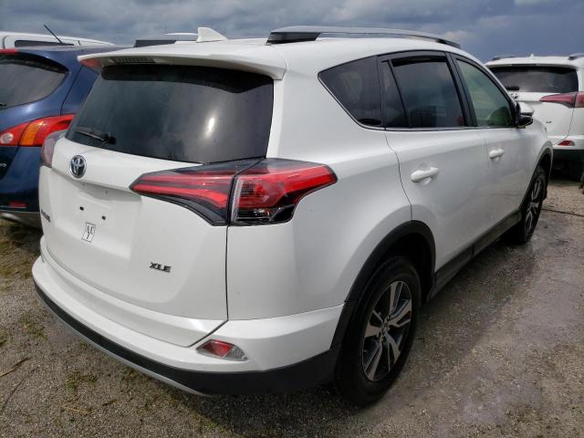 Photo 4 from auction – 2017 TOYOTA RAV4 XLE with VIN JTMWFREV1HJ123748