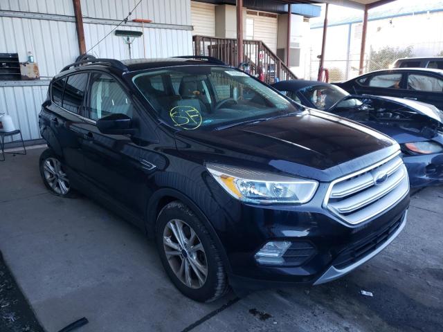 FORD ESCAPE SE 2018 with VIN 1FMCU9GD7JUA39138 - Photo from auction