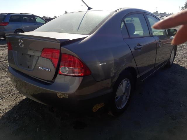 Photo 4 from auction – 2006 HONDA CIVIC HYBR with VIN JHMFA36256S026512
