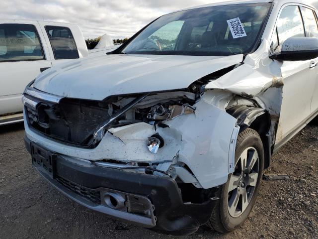 Photo 9 from auction – 2019 HONDA RIDGELINE with VIN 5FPYK3F77KB033530
