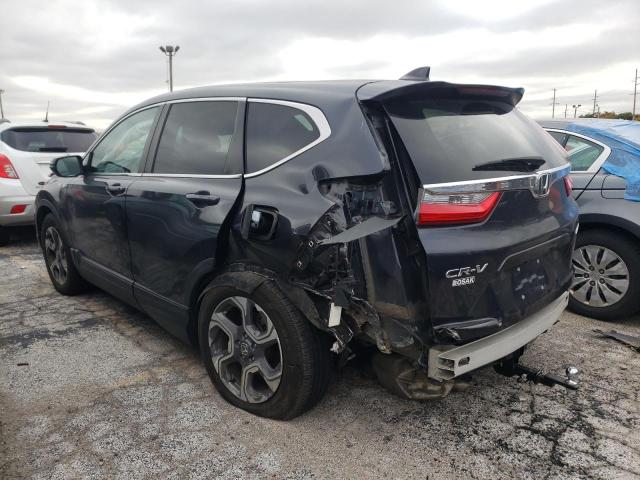Photo 3 from auction – 2018 HONDA CR-V EX with VIN 7FARW2H54JE070352