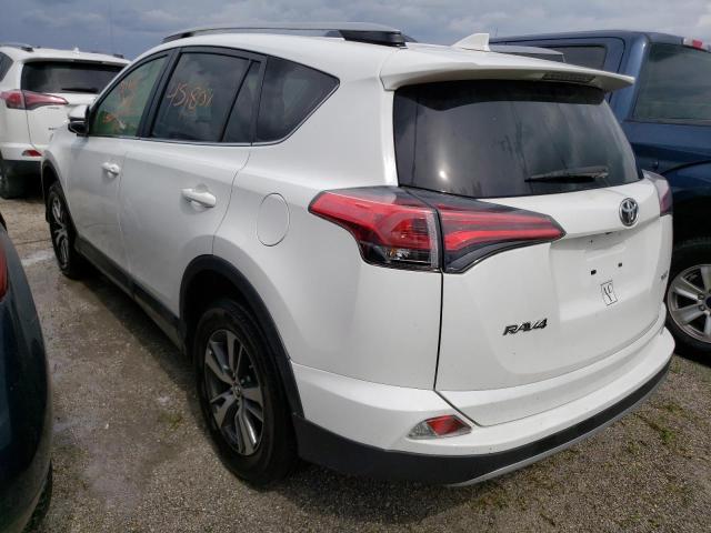 Photo 3 from auction – 2017 TOYOTA RAV4 XLE with VIN JTMWFREV1HJ123748