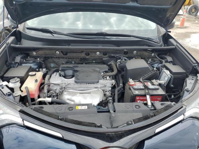 Photo 7 from auction – 2018 TOYOTA RAV4 LE with VIN JTMZFREV2JJ204020