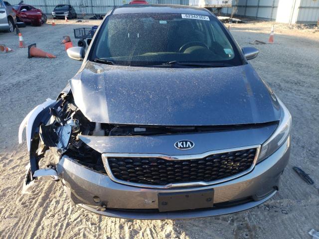 Photo 9 from auction – 2018 KIA FORTE LX with VIN 3KPFL4A75JE200322