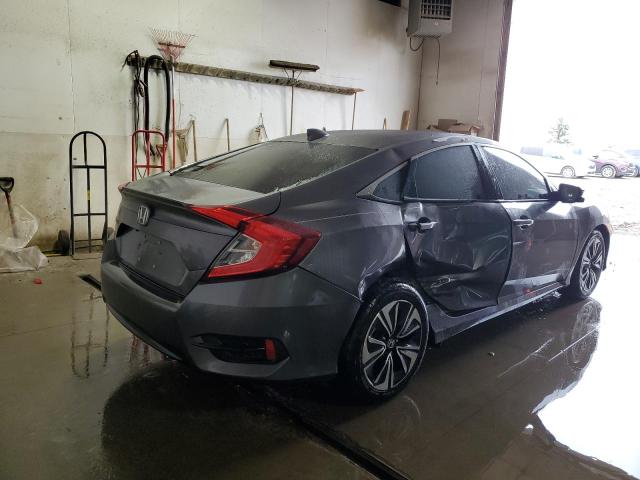Photo 4 from auction – 2017 HONDA CIVIC EX with VIN 19XFC1F4XHE027677