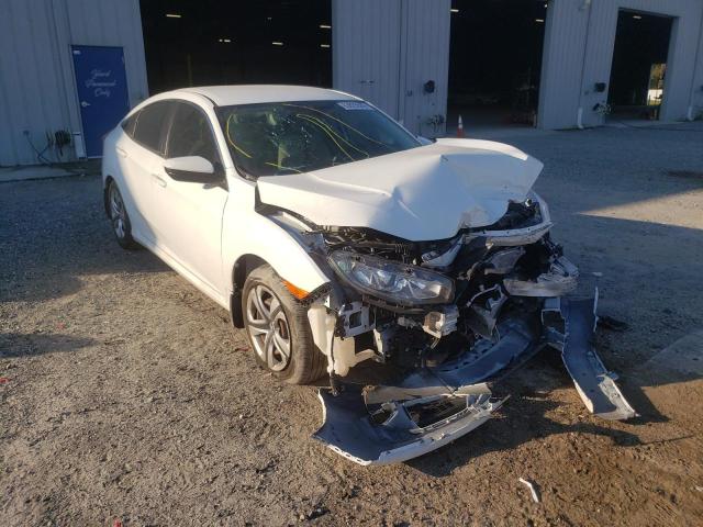 HONDA CIVIC LX 2018 with VIN 19XFC2F56JE012713 - Photo from auction