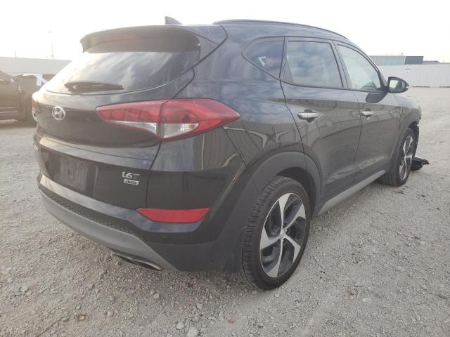Photo 4 from auction – 2018 HYUNDAI TUCSON VAL with VIN KM8J3CA25JU827589