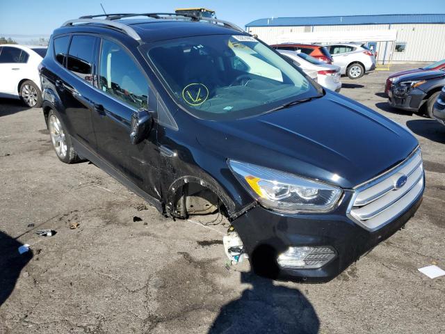 FORD ESCAPE TIT 2018 with VIN 1FMCU9J91JUA78022 - Photo from auction