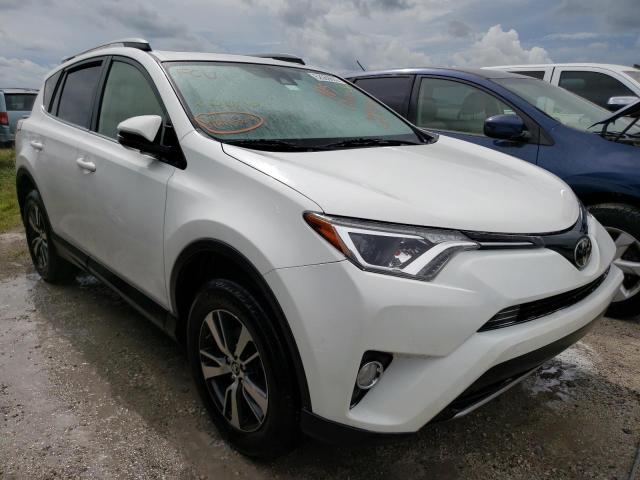 TOYOTA RAV4 XLE 2017 with VIN JTMWFREV1HJ123748 - Photo from auction