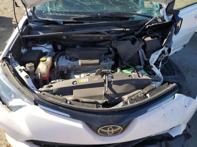 Photo 7 from auction – 2018 TOYOTA RAV4 LE with VIN 2T3BFREV6JW851586