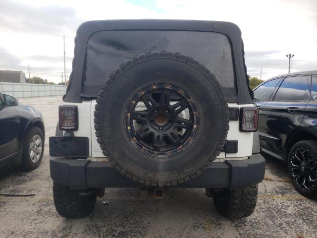 Photo 9 from auction – 2011 JEEP WRANGLER U with VIN 1J4BA3H16BL592066