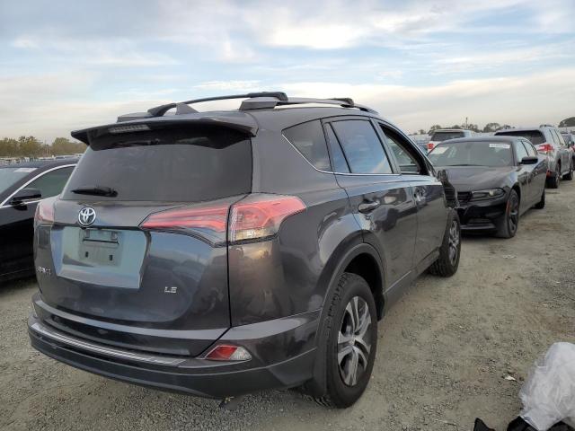Photo 4 from auction – 2017 TOYOTA RAV4 LE with VIN JTMZFREV5HJ713089