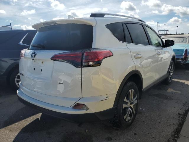 Photo 4 from auction – 2018 TOYOTA RAV4 LE with VIN JTMZFREV0JD111480