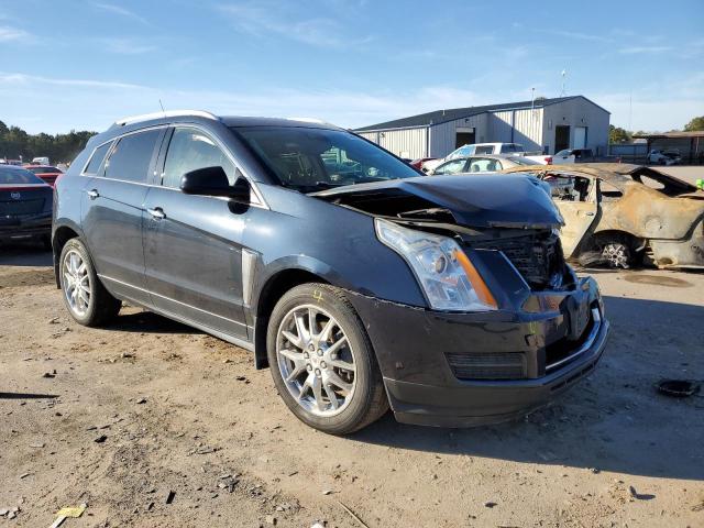 CADILLAC SRX 2014 with VIN 3GYFNBE3XES613022 - Photo from auction