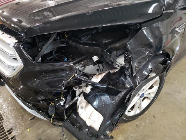 Photo 9 from auction – 2018 FORD ESCAPE SE with VIN 1FMCU9GD5JUD27532