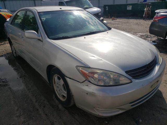 TOYOTA CAMRY LE 2002 with VIN 4T1BF32K72U030353 - Photo from auction