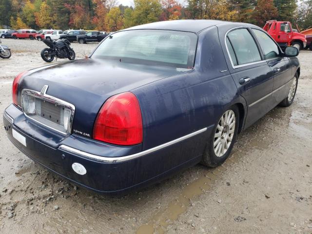 Photo 4 from auction – 2003 LINCOLN TOWN CAR with VIN 1LNHM82W83Y635895