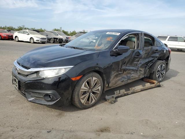 Photo 2 from auction – 2016 HONDA CIVIC EX with VIN 2HGFC1F35GH635957