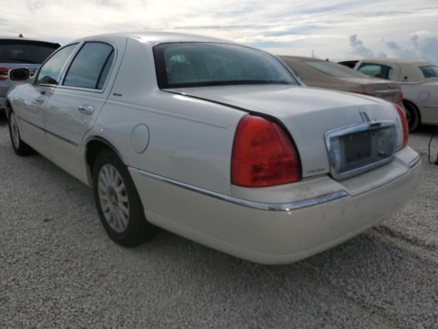 Photo 3 from auction – 2003 LINCOLN TOWN CAR E with VIN 1LNHM81W33Y703795