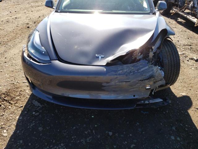 Photo 9 from auction – 2022 TESLA MODEL 3 with VIN 5YJ3E1EA5NF186861