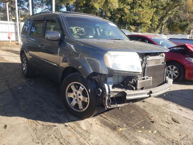 HONDA PILOT TOUR 2010 with VIN 5FNYF4H89AB037473 - Photo from auction