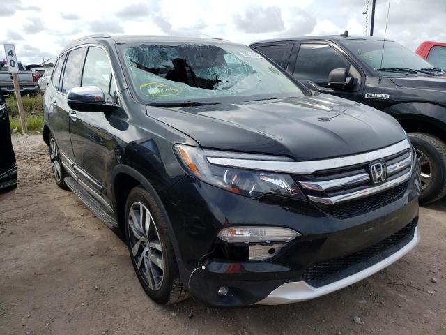 HONDA PILOT ELIT 2018 with VIN 5FNYF6H03JB007441 - Photo from auction