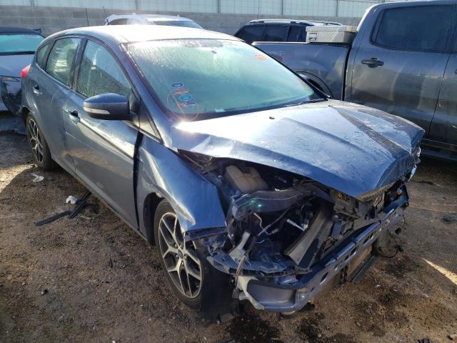 FORD FOCUS SEL 2018 with VIN 1FADP3M21JL261007 - Photo from auction