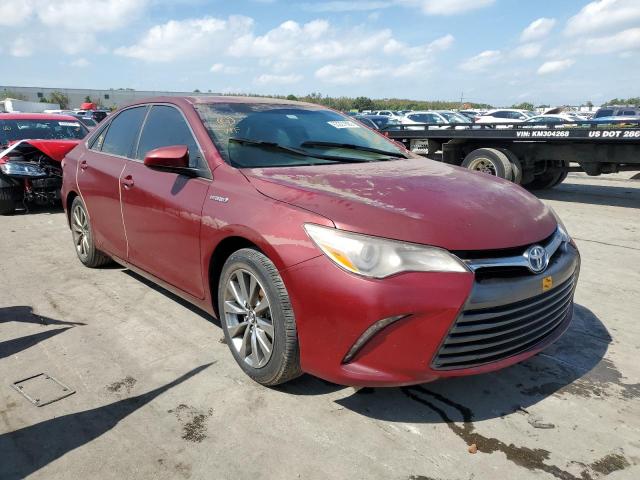 TOYOTA CAMRY HYBR 2016 with VIN 4T1BD1FK5GU192297 - Photo from auction