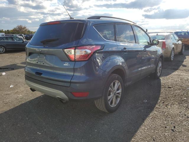 Photo 4 from auction – 2018 FORD ESCAPE SE with VIN 1FMCU9GD0JUA93171