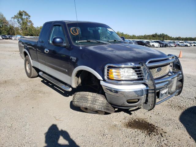 Photo 9 from auction – 2002 FORD F150 with VIN 1FTRX18L42NB49573