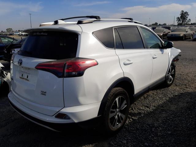 Photo 4 from auction – 2016 TOYOTA RAV4 XLE with VIN 2T3RFREV8GW533251