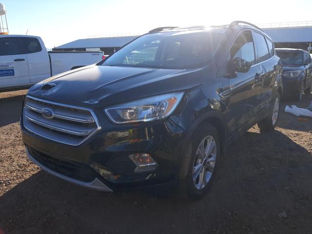 FORD ESCAPE SE 2018 with VIN 1FMCU0GD4JUB70815 - Photo from auction