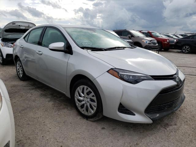 TOYOTA COROLLA L 2018 with VIN 5YFBURHE7JP839992 - Photo from auction
