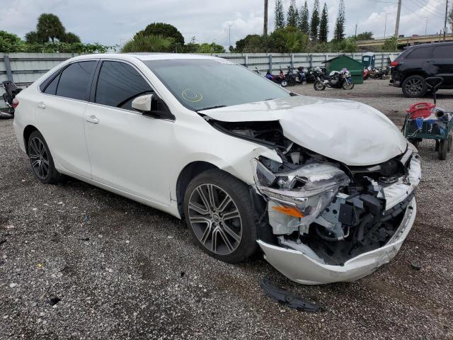 TOYOTA CAMRY LE 2016 with VIN 4T1BF1FK4GU176702 - Photo from auction