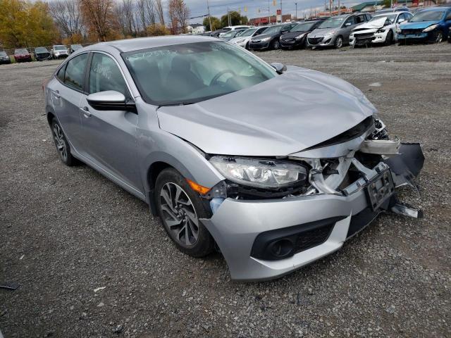 HONDA CIVIC LX 2018 with VIN 2HGFC2F62JH009306 - Photo from auction