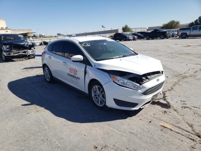 FORD FOCUS SE 2014 with VIN 1FADP3F25EL145232 - Photo from auction