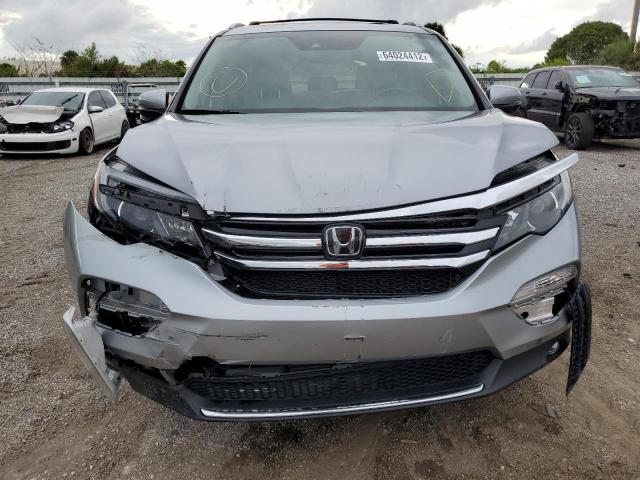 Photo 9 from auction – 2017 HONDA PILOT TOUR with VIN 5FNYF6H99HB035284