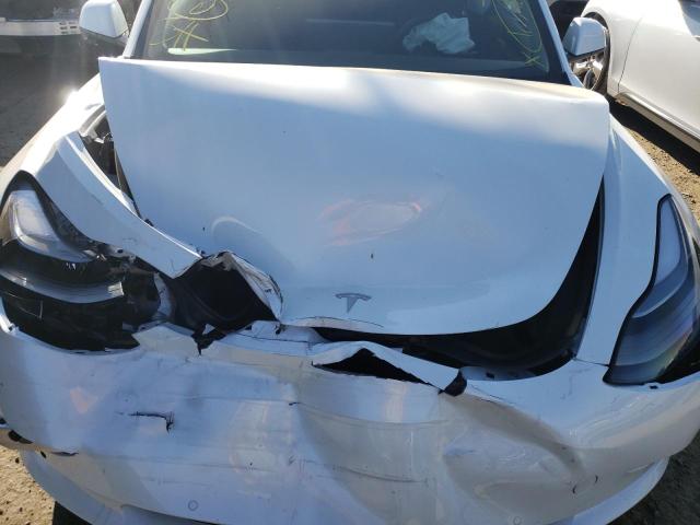 Photo 7 from auction – 2021 TESLA MODEL 3 with VIN 5YJ3E1EA4MF021625