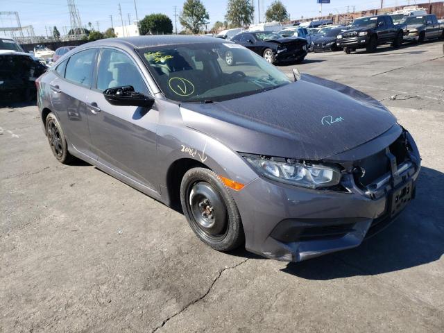 HONDA CIVIC LX 2018 with VIN 2HGFC2F5XJH520561 - Photo from auction