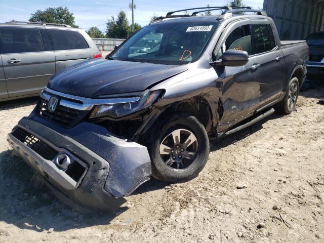 Photo 2 from auction – 2018 HONDA RIDGELINE with VIN 5FPYK3F72JB012177