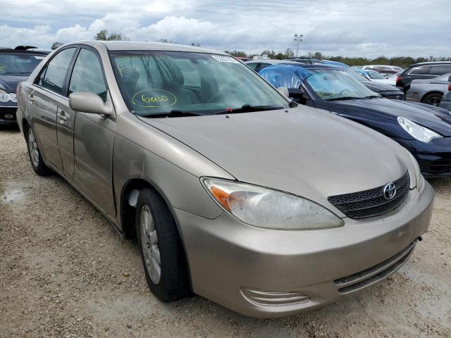 TOYOTA CAMRY LE 2002 with VIN 4T1BF32K32U528503 - Photo from auction