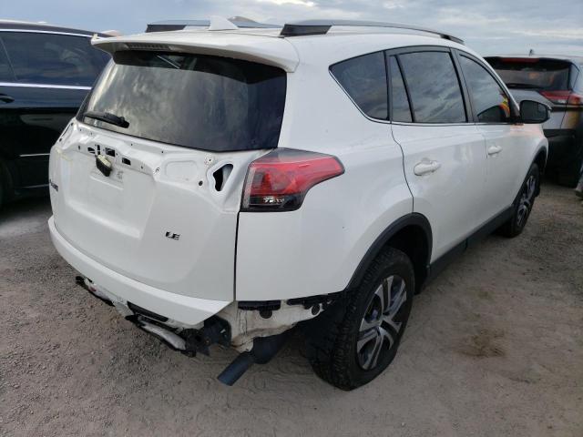 Photo 4 from auction – 2017 TOYOTA RAV4 LE with VIN JTMZFREV2HJ130883