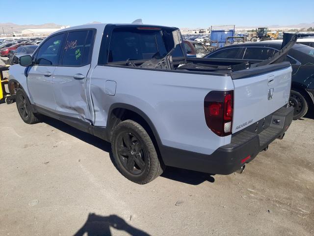 Photo 3 from auction – 2022 HONDA RIDGELINE with VIN 5FPYK3F81NB029051