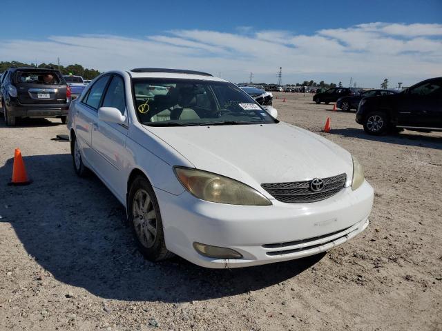 TOYOTA CAMRY LE 2004 with VIN 4T1BE32KX4U286301 - Photo from auction