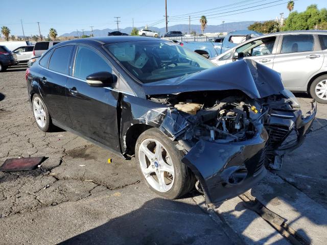 FORD FOCUS TITA 2014 with VIN 1FADP3J23EL254635 - Photo from auction