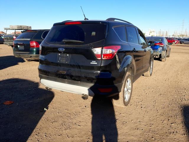 Photo 3 from auction – 2018 FORD ESCAPE SE with VIN 1FMCU0GD4JUB70815