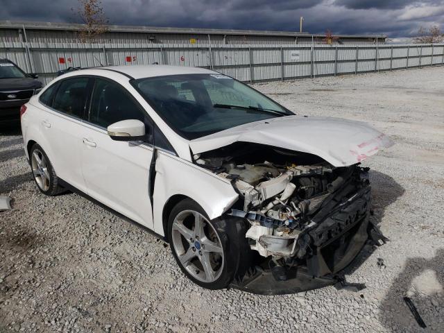 FORD FOCUS TITA 2012 with VIN 1FAHP3J2XCL242299 - Photo from auction