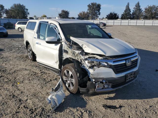 Photo 9 from auction – 2018 HONDA RIDGELINE with VIN 5FPYK3F78JB015164