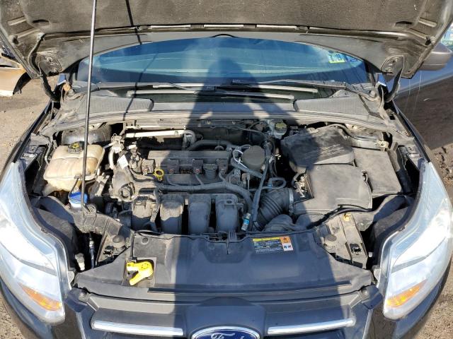 Photo 7 from auction – 2014 FORD FOCUS S with VIN 1FADP3E23EL171104