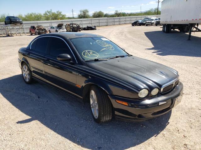 JAGUAR X-TYPE 3.0 2003 with VIN SAJEA51C83WD43802 - Photo from auction